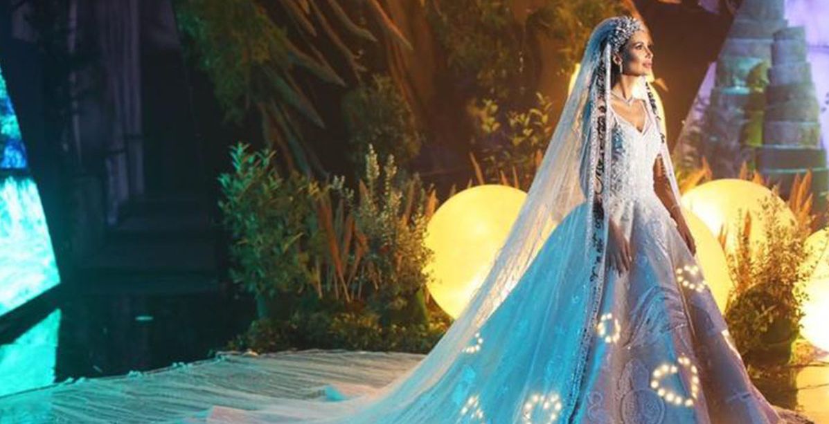 أليس عبد العزيز تطل بفستان زفاف مضيء