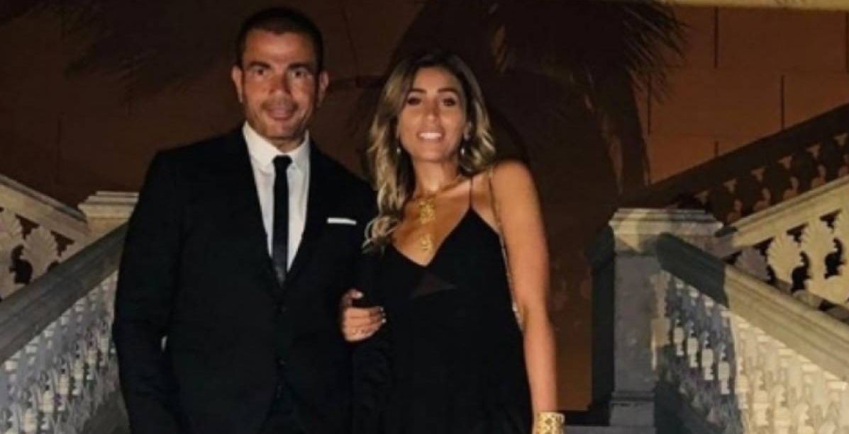 عمرو دياب يحمل دينا الشربيني على ظهره ويجعلها بطلة كليبه الجديد