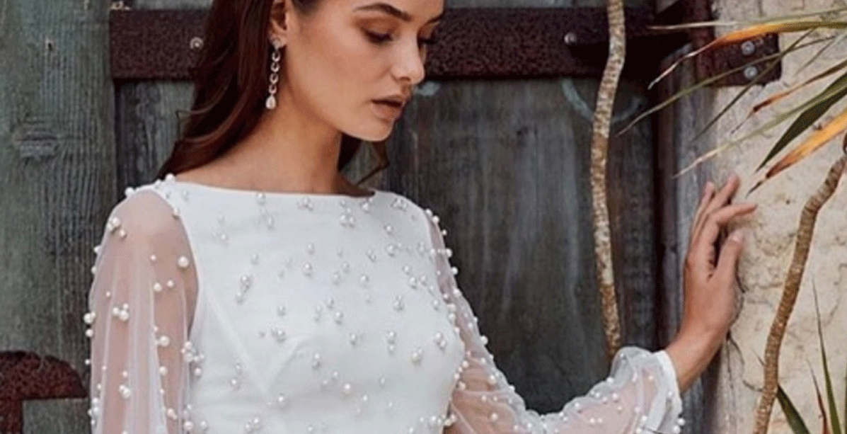 فساتين زفاف مطرزة باللؤلؤ