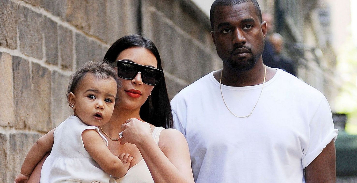 كيم كارداشيان وكانيي ويست مع إبنتهما