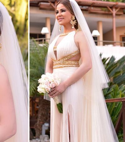 صور فساتين زفاف ذهبية | صور فساتين عرايس الفنانات