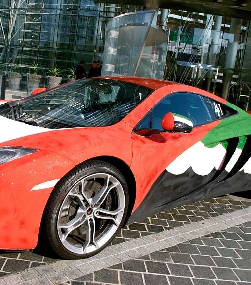 العلم الوطني يلوّن السيارات