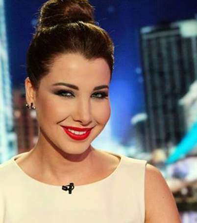 شاهدي الصور الاولى لمكياج وشعر نانسي عجرم 2014 في آراب آيدول في الموسم الثالث 